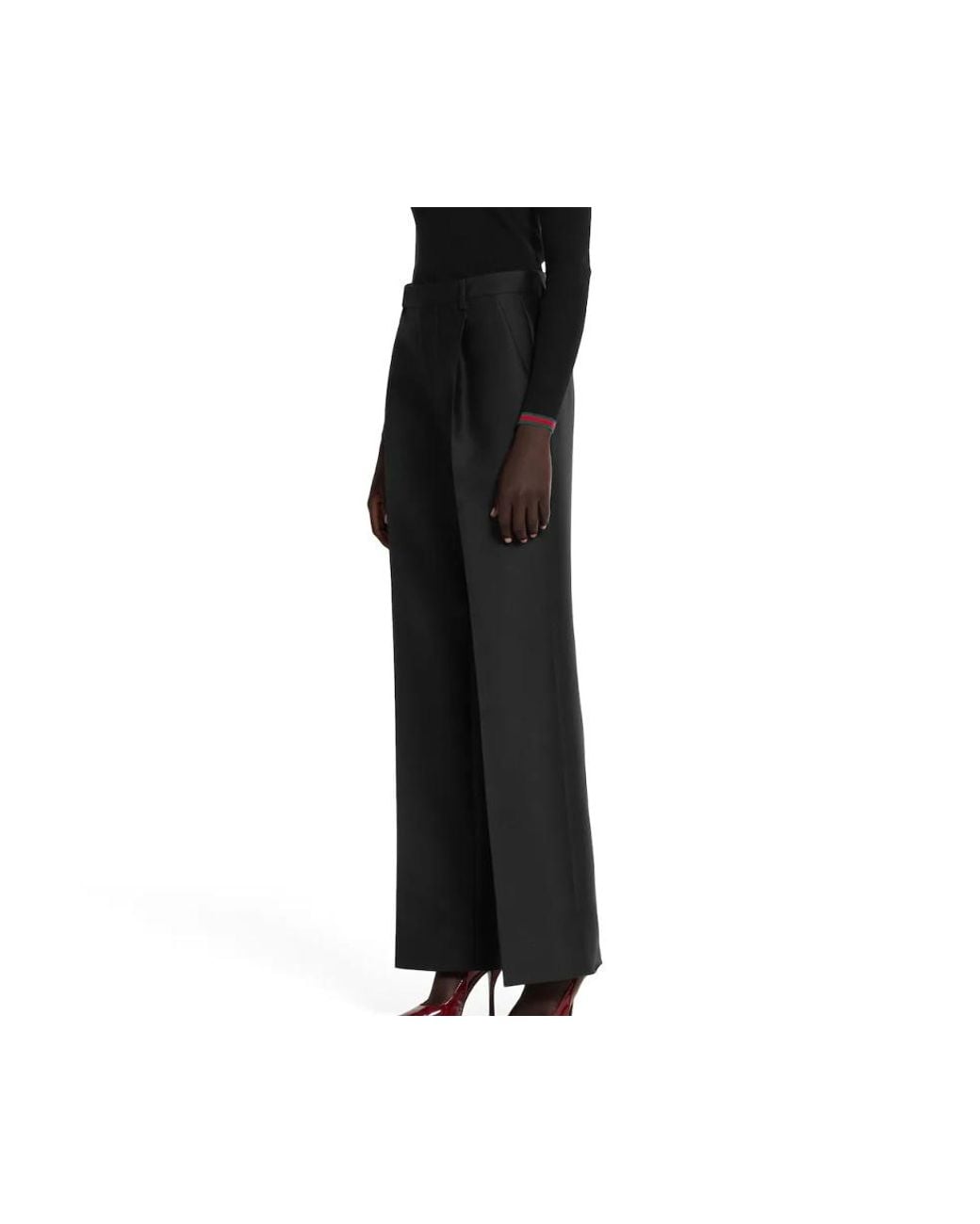 Gucci Black Logo Embossed Trousers