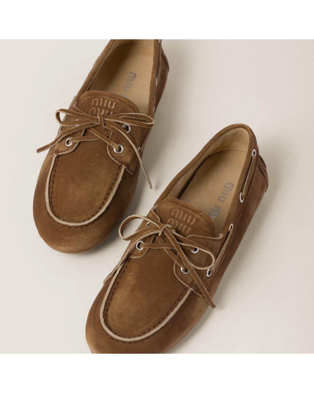 Miu Miu Brown Logo Embossed Loafers