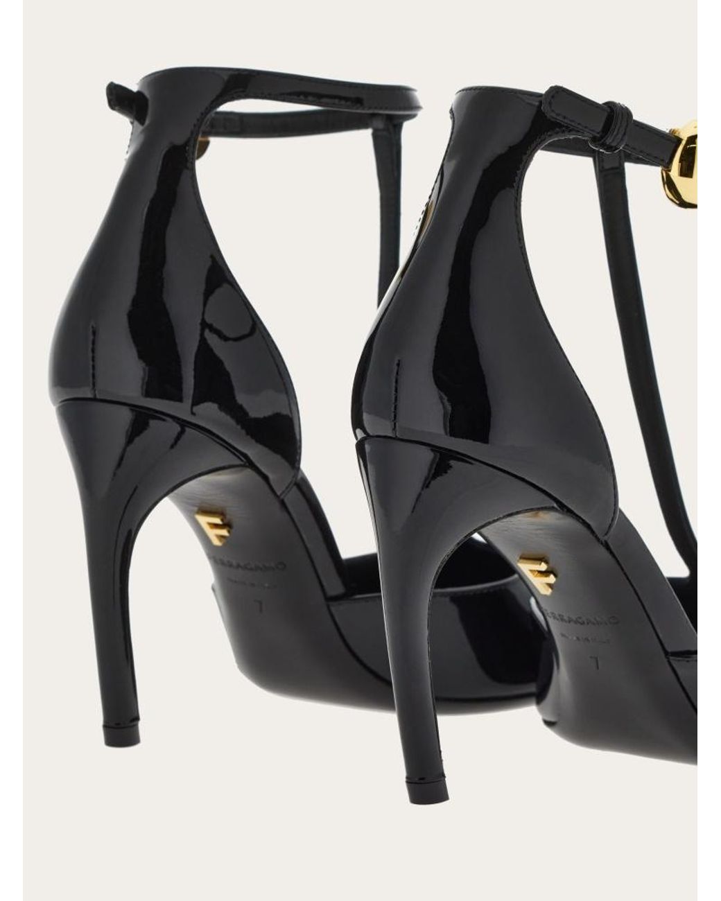Ferragamo White Ferragamo T-Strap Pointed-Toe Pumps