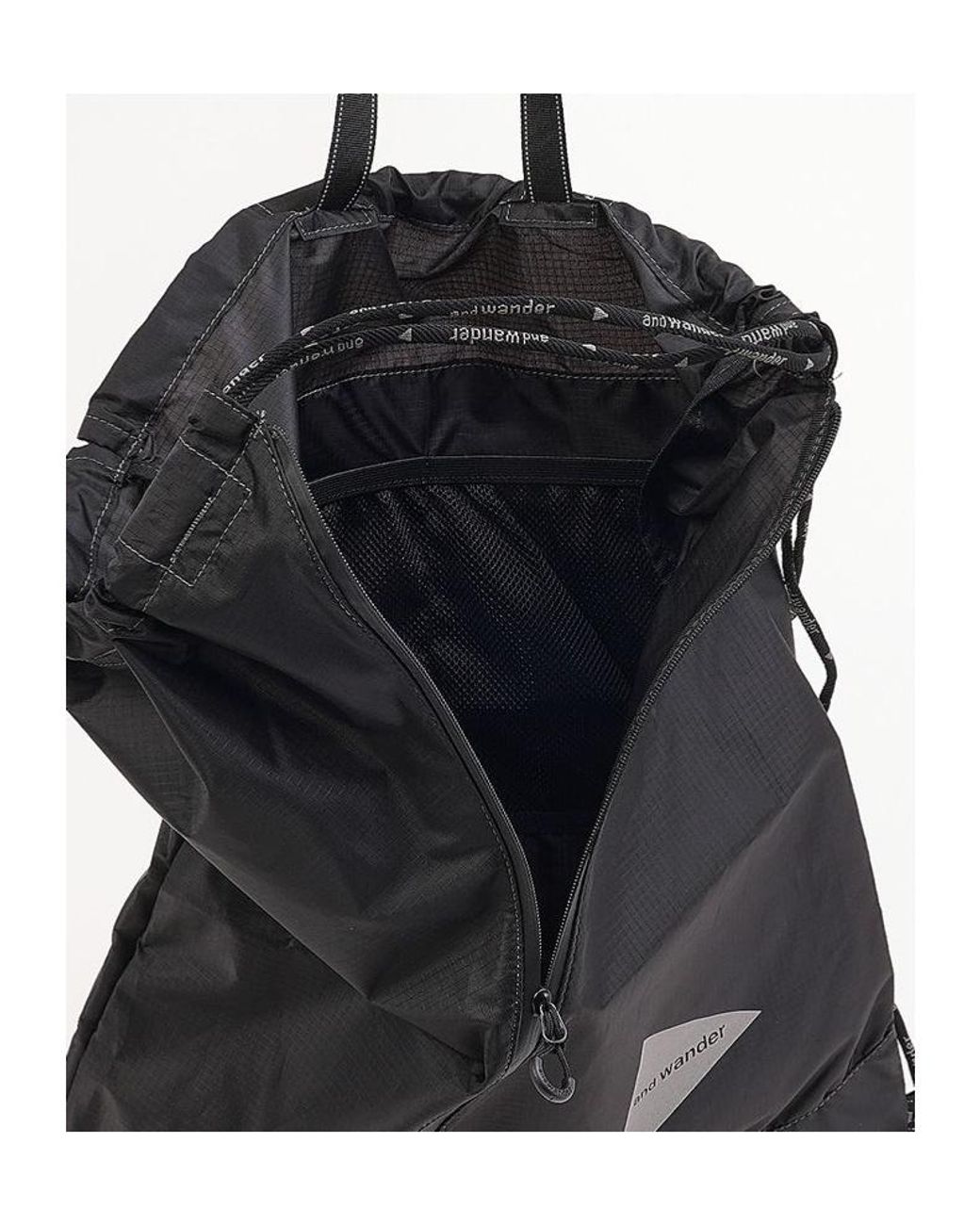 And Wander Black Drawstring Tote Bag for men