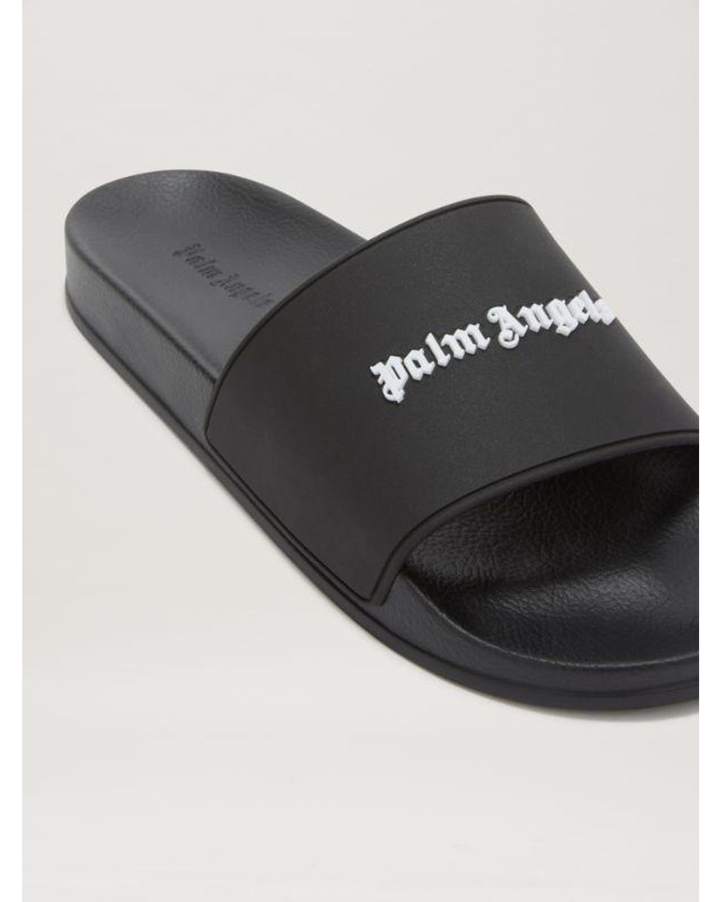 Palm Angels Black Logo Embossed Slippers for men