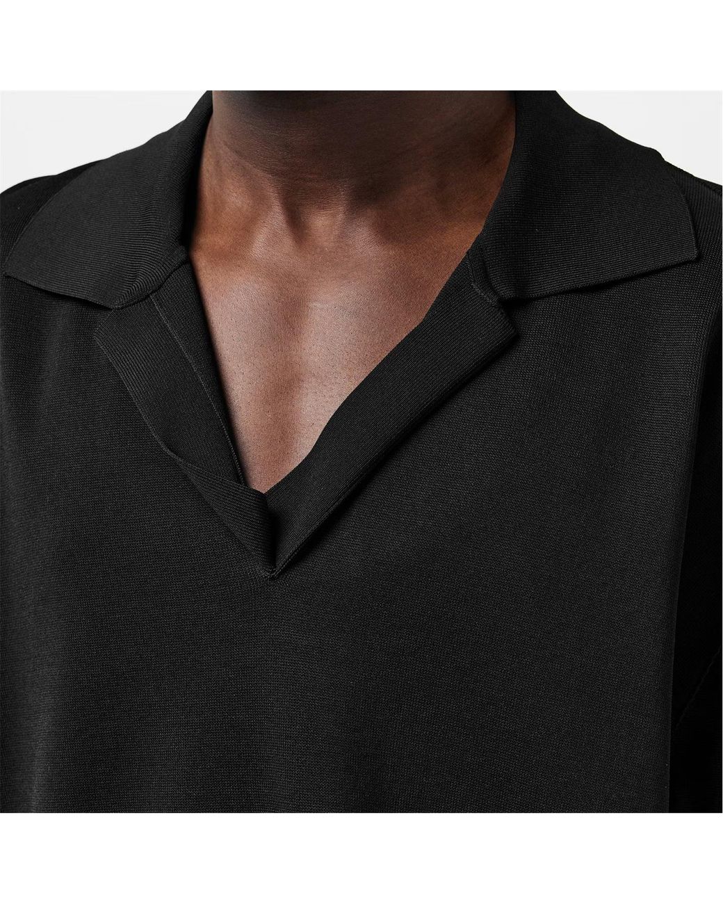 AMI Black Knitted Short-Sleeved Polo Shirt for men