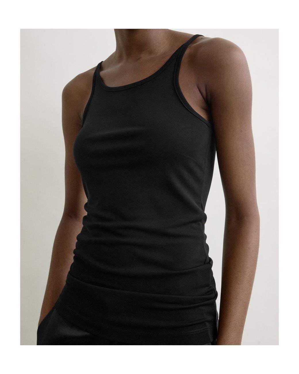 Totême Black Fluid Tank