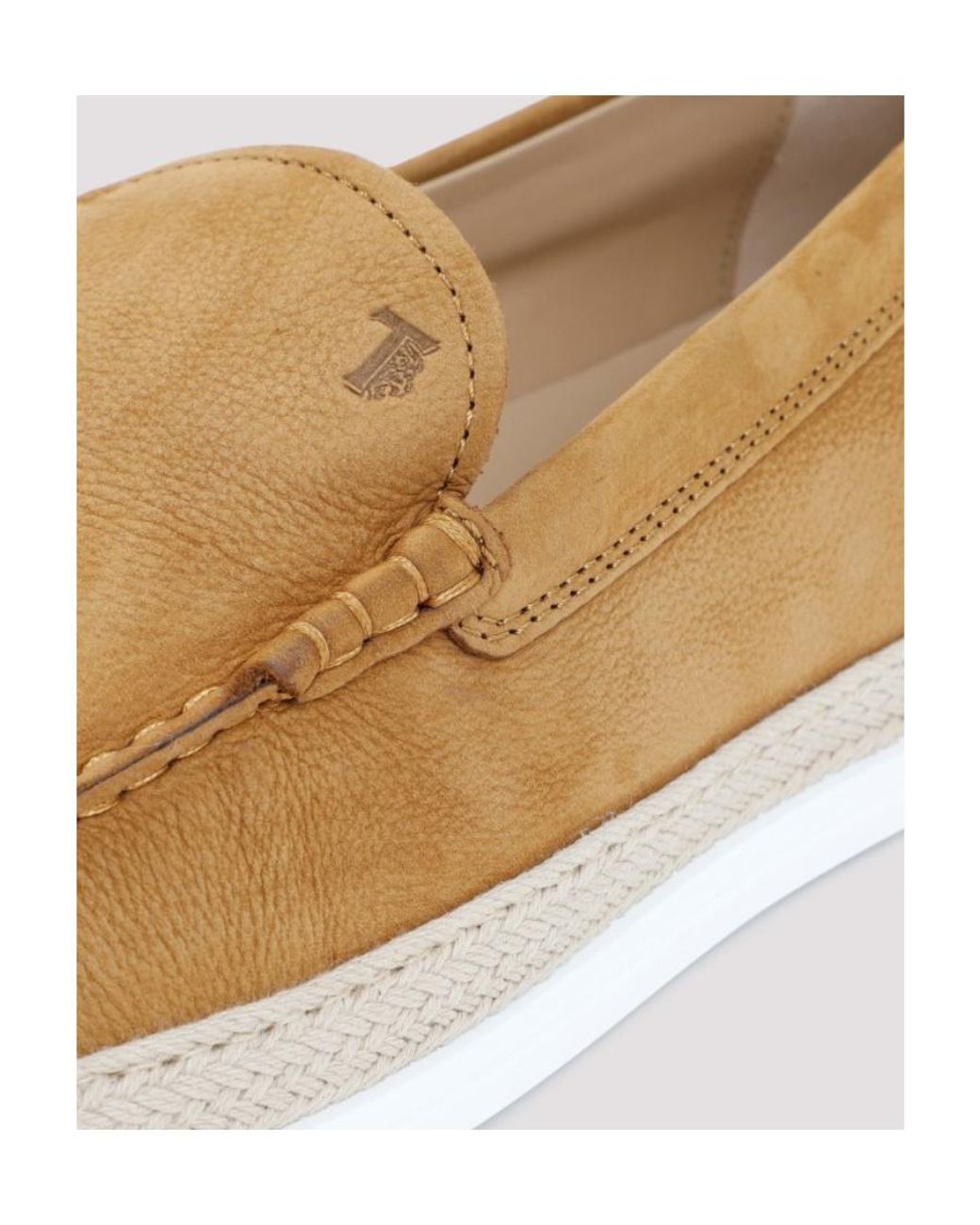 Tod's White Logo Embossed Slip-On Loafers for men