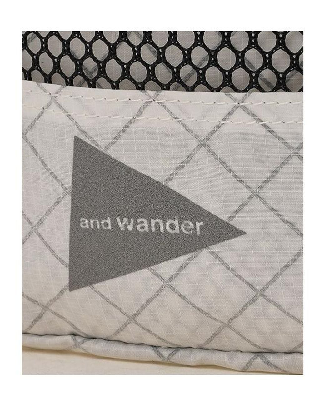 And Wander Black Mesh Pocket Shoulder Bag for men