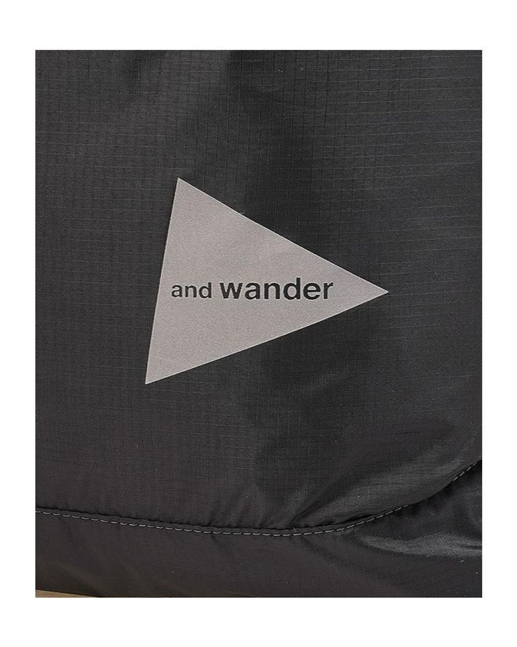 And Wander Black Drawstring Tote Bag for men