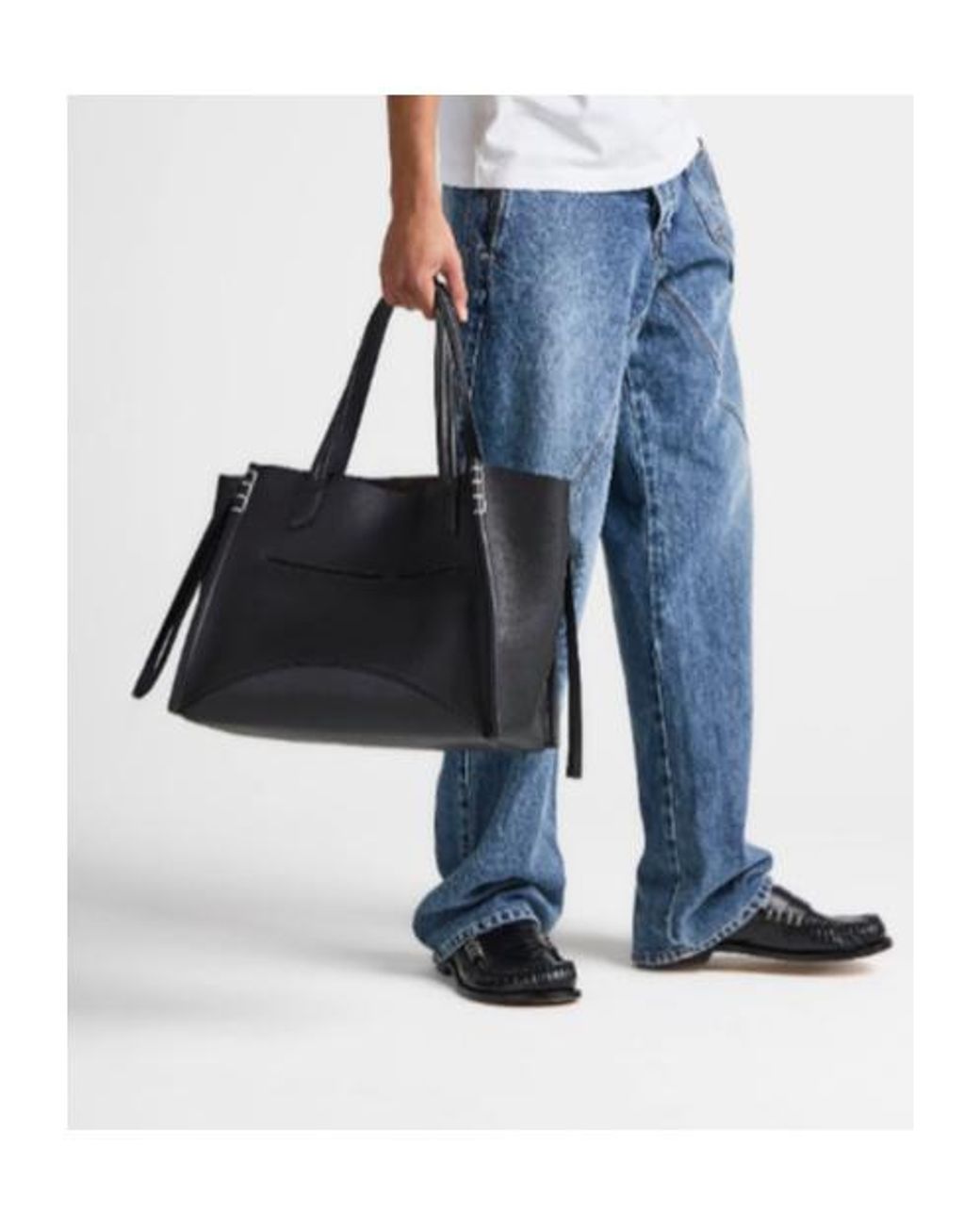 J.W. Anderson Black Jw Anderson Logo Embossed Tote Bag for men