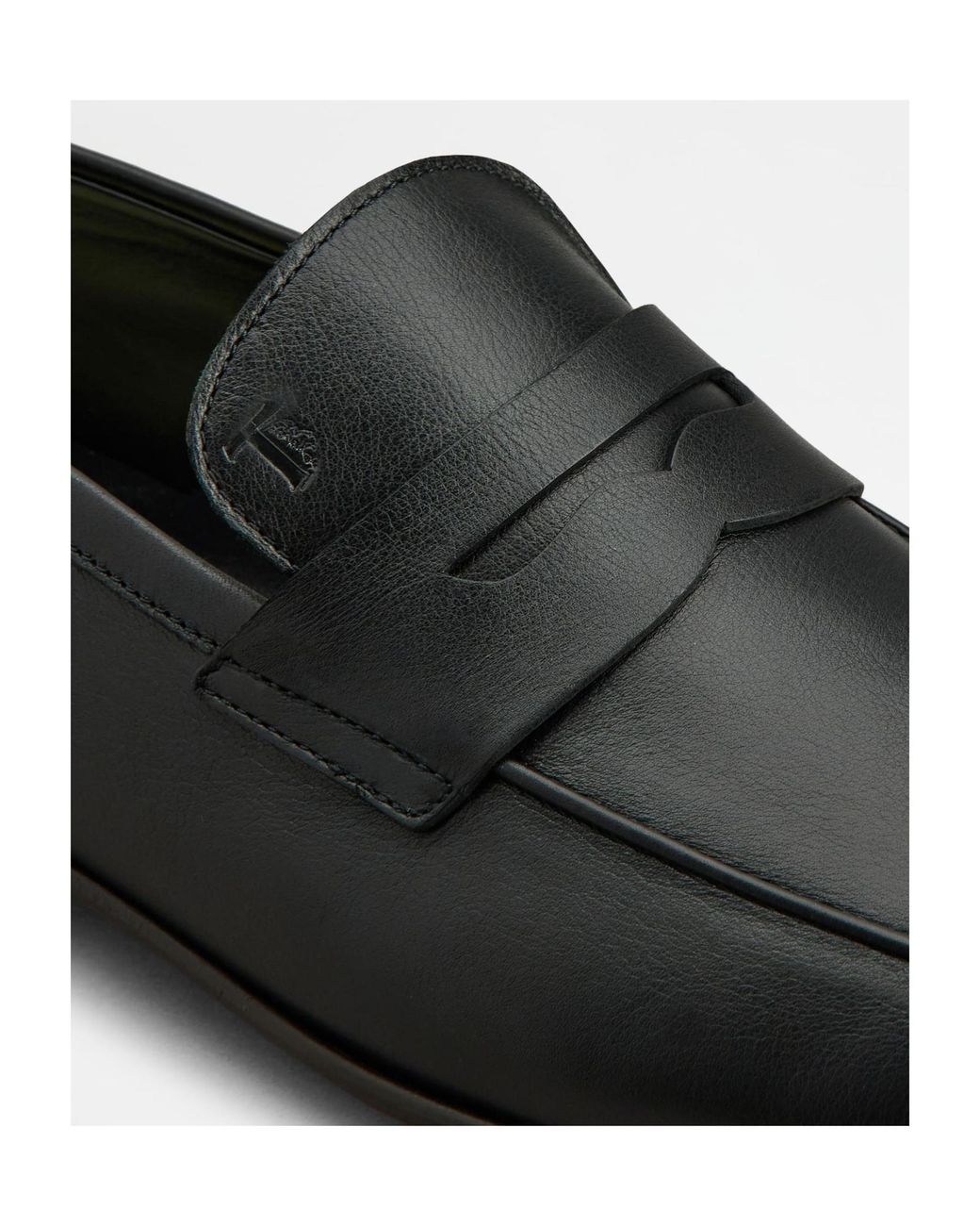 Tod's Black Round Toe Slip-On Loafers for men