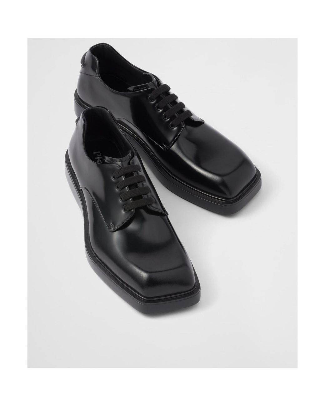 Prada Black Brushed Leather Derby Shoes for men