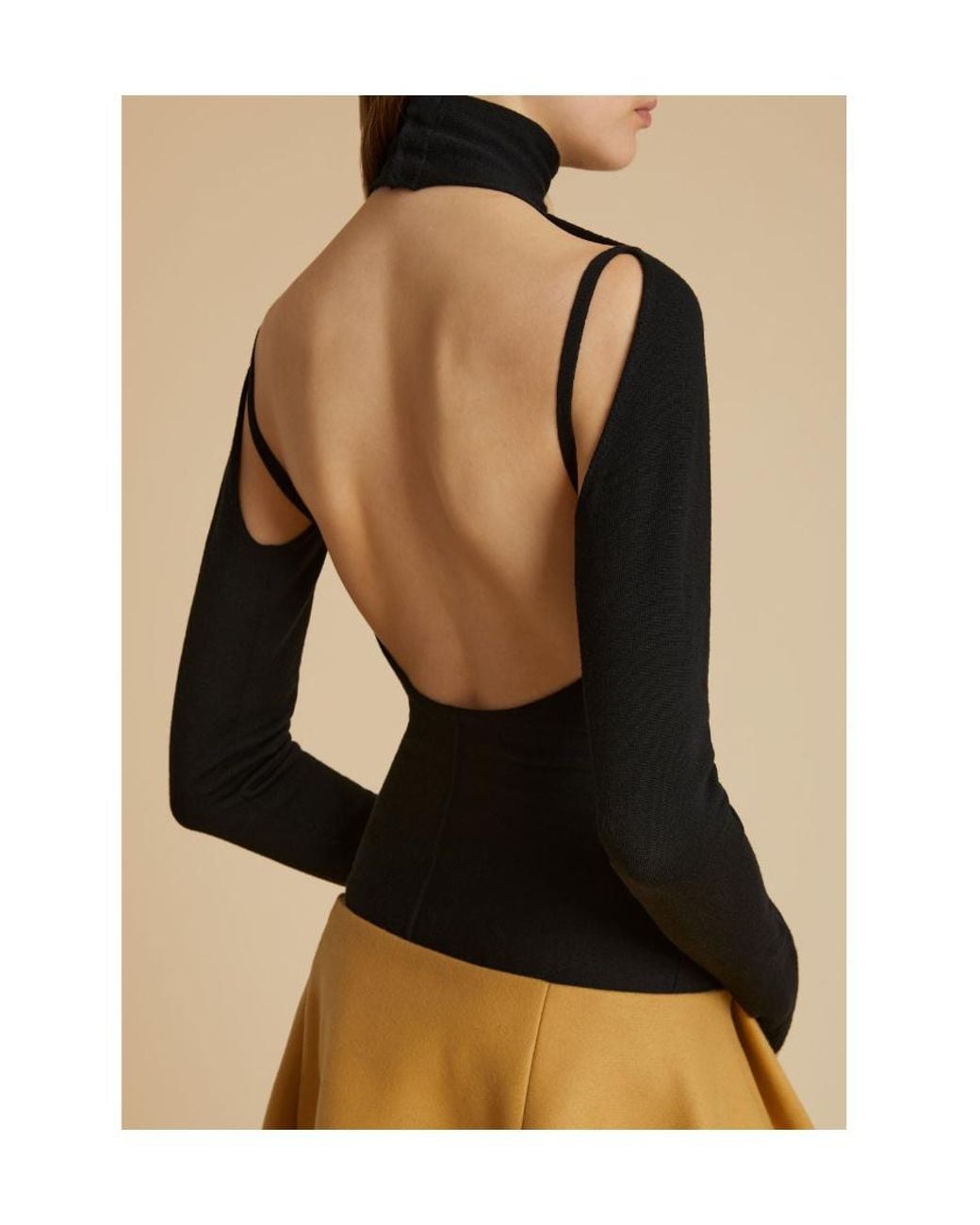 Khaite Black Turtleneck Cut-Out Detailed Top