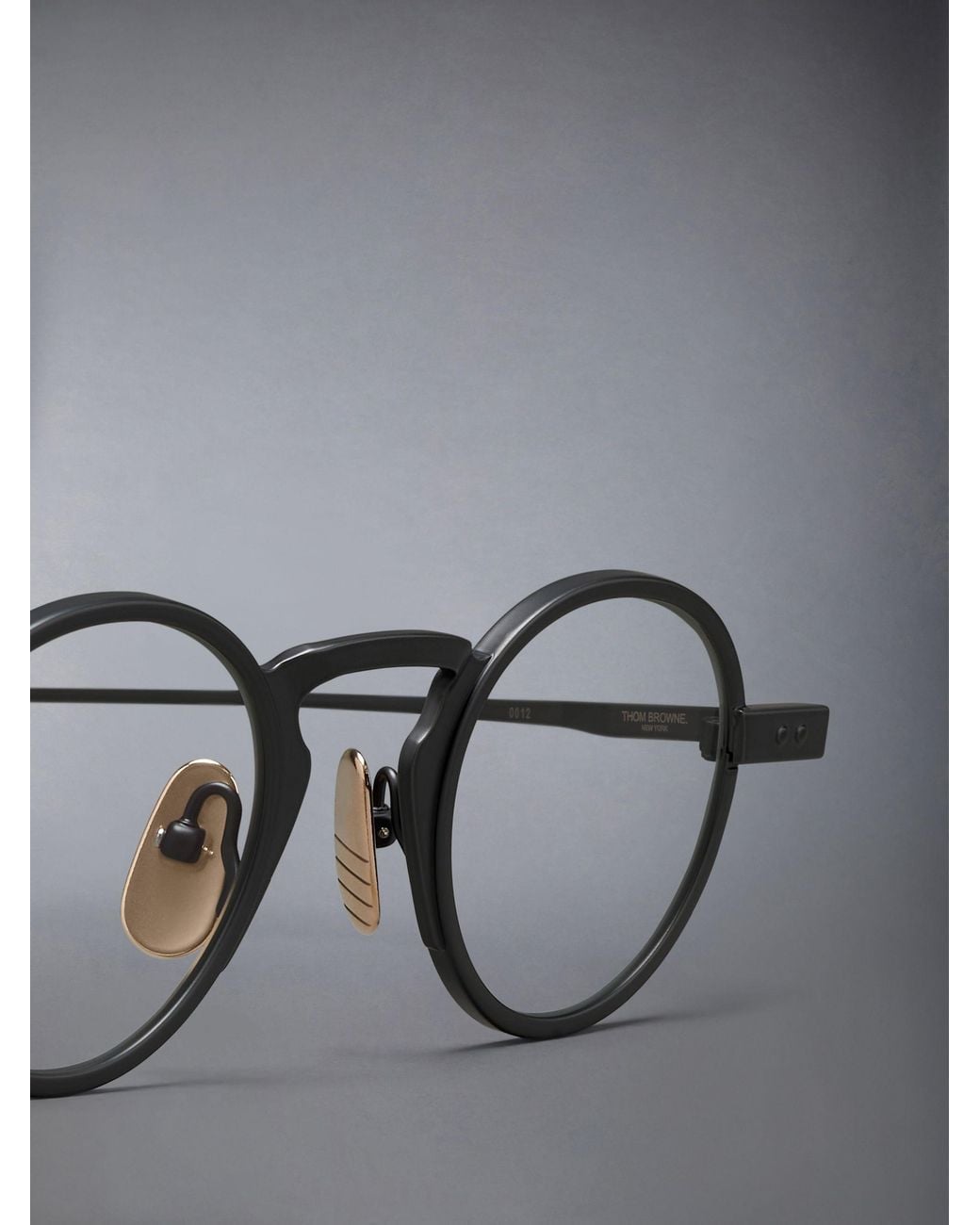 Thom Browne White Eyewear Round Frame Glasses for men