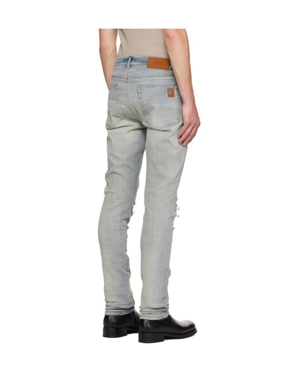 Amiri Blue Stud-Embellished Distressed Jeans for men