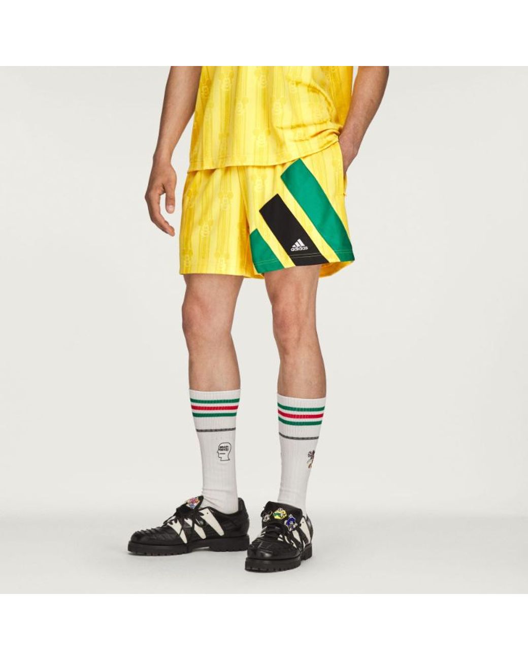 Adidas Yellow Originals Brain Dead Disney Graphic Shorts for men