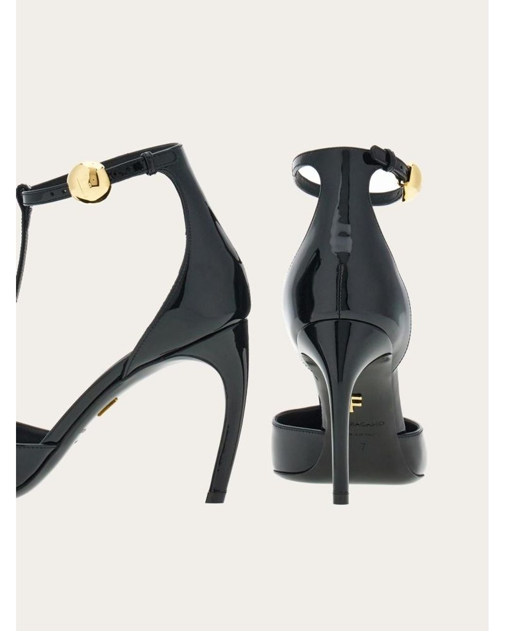Ferragamo White Ferragamo T-Strap Pointed-Toe Pumps