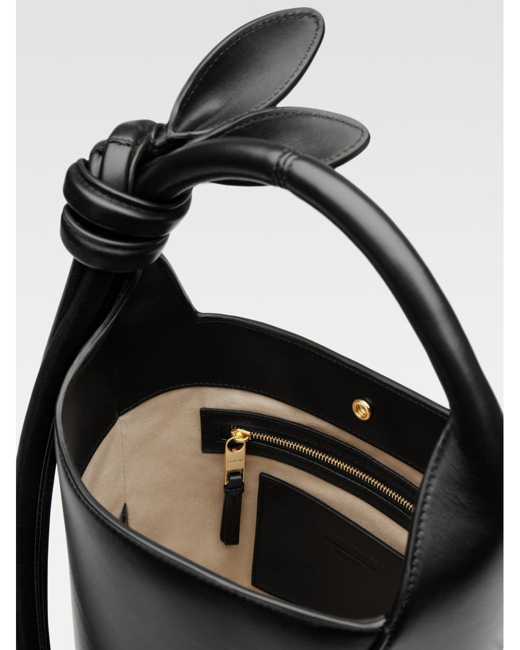 Jacquemus Black Le Petit Tourni Logo Plaque Bucket Bag