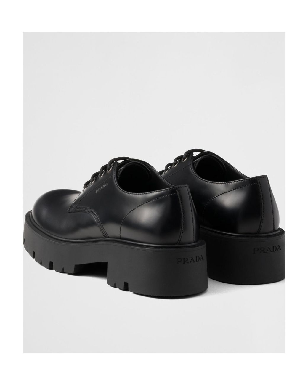 Prada Black Brushed Leather Derby Shoes for men