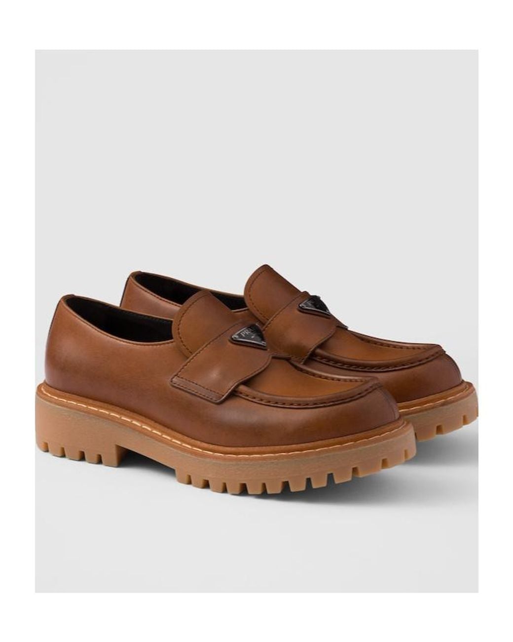 Prada Brown Logo Plaque Round Toe Loafers for men