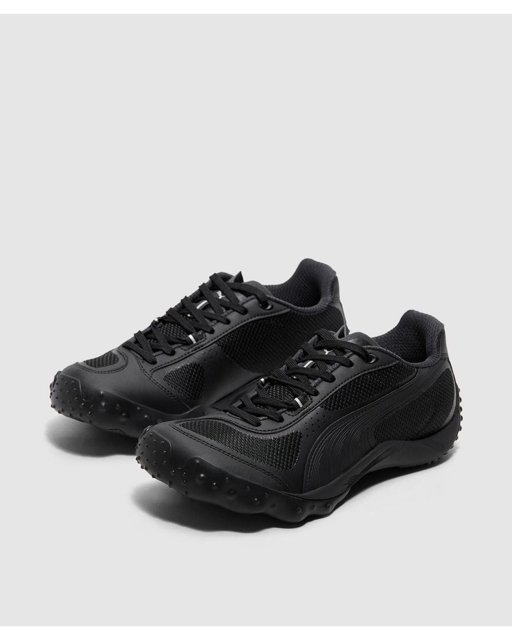 PUMA Black Achillium Sneaker -Flat Dark for men