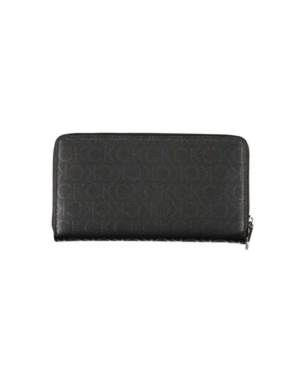 Calvin Klein Black Sleek Designer Three-Compartment Wallet