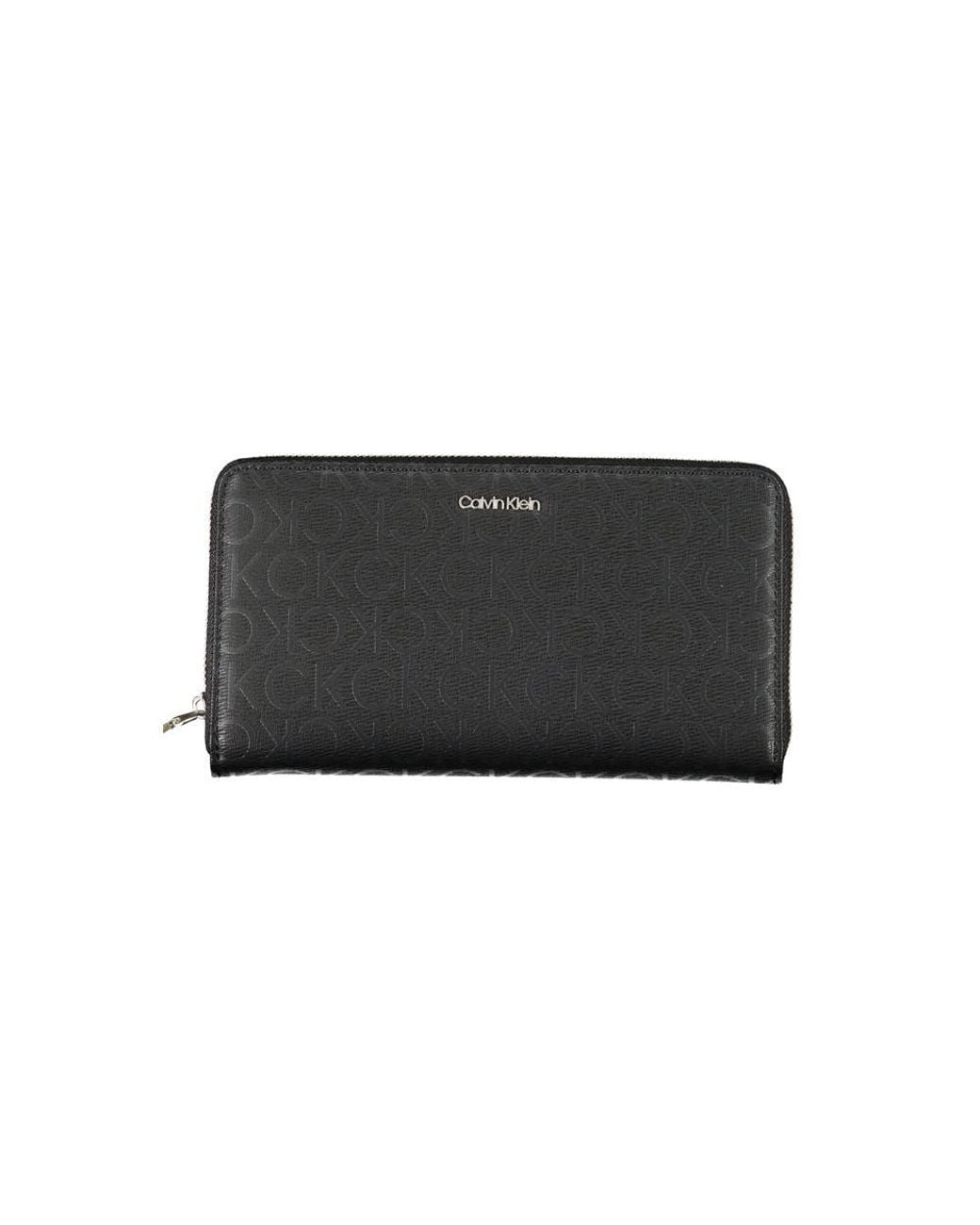 Calvin Klein Black Sleek Designer Three-Compartment Wallet