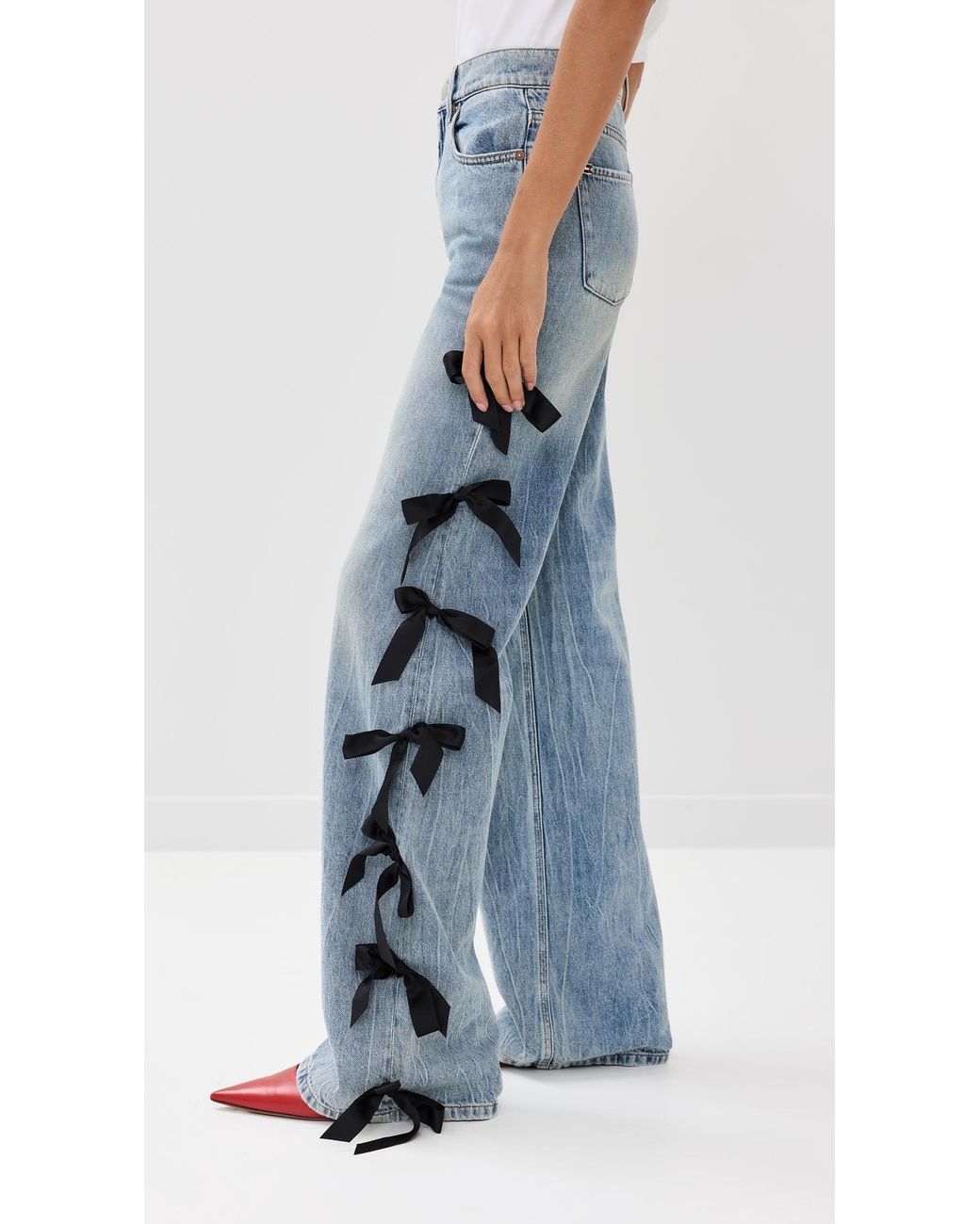 Alice + Olivia Weezy Full Length Jeans With Side Bows in Blue | Lyst