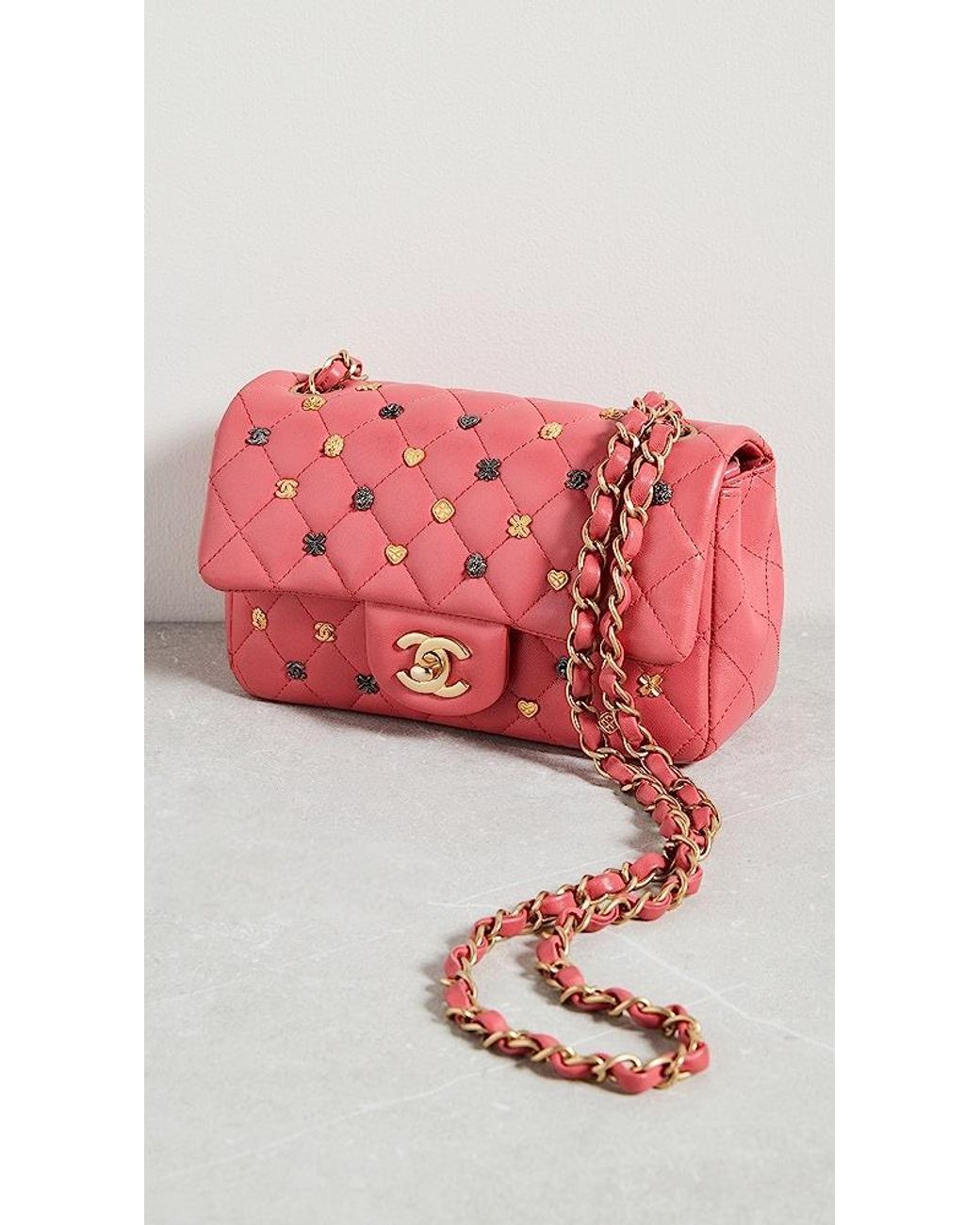 What Goes Around Comes Around Chanel Pink Lucky Charm Rectangle Flip Mini  Clutch in Red | Lyst