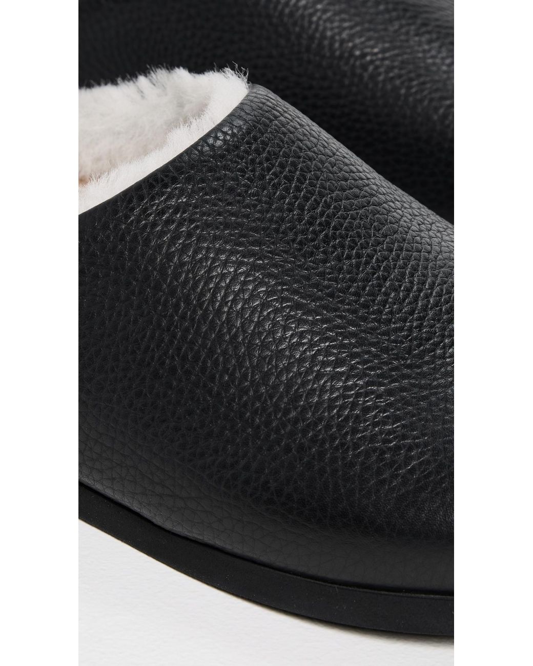 Common Projects Black Clogs