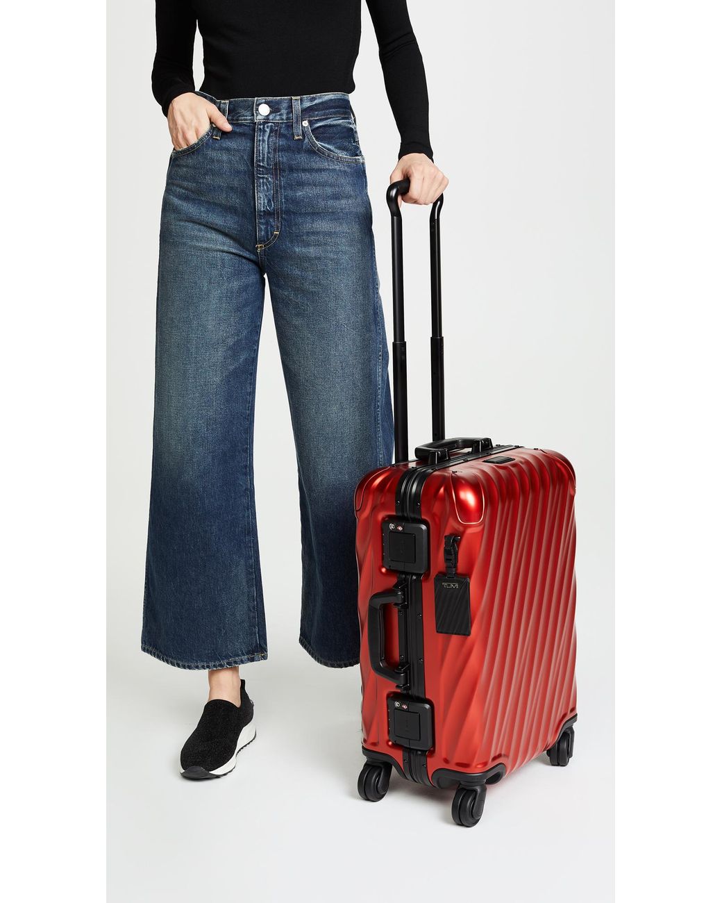 Tumi red hotsell carry on