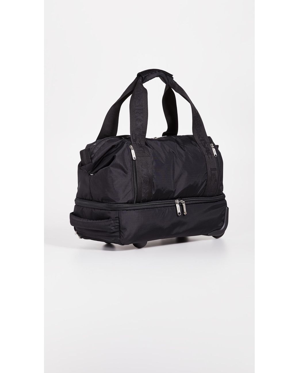 LeSportsac Dakota Medium Roller Duffel Bag in Black | Lyst