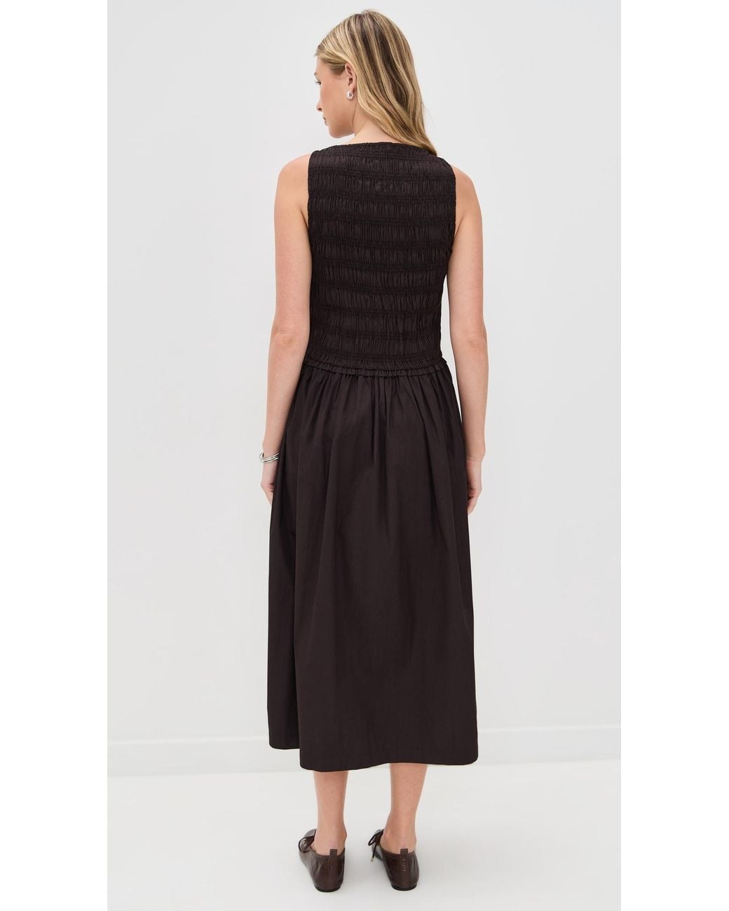 knee length dresses for ladies Black Floral Smocked Midi Dress – The A to Z Boutique main image 0