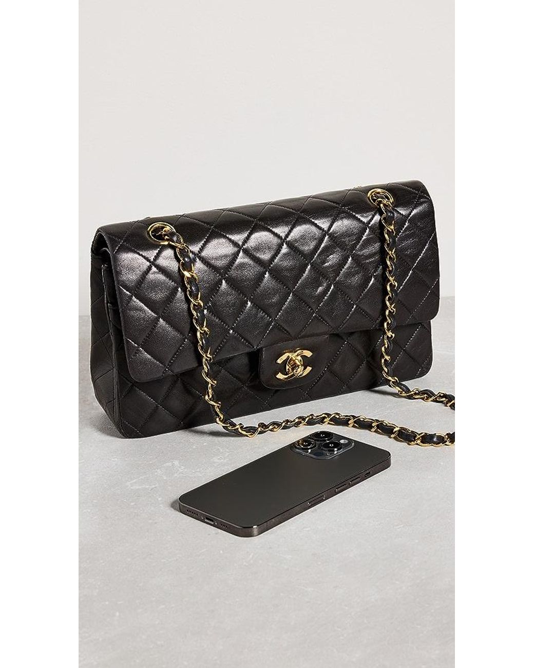 What Goes Around Comes Around Chanel Black Lambskin Flap Bag