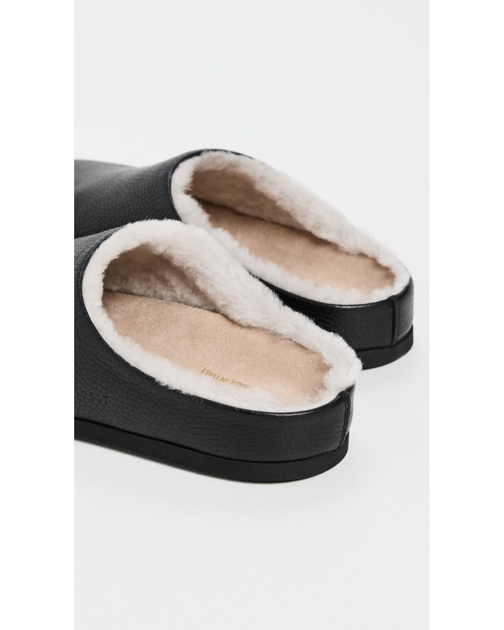 Common Projects Black Clogs