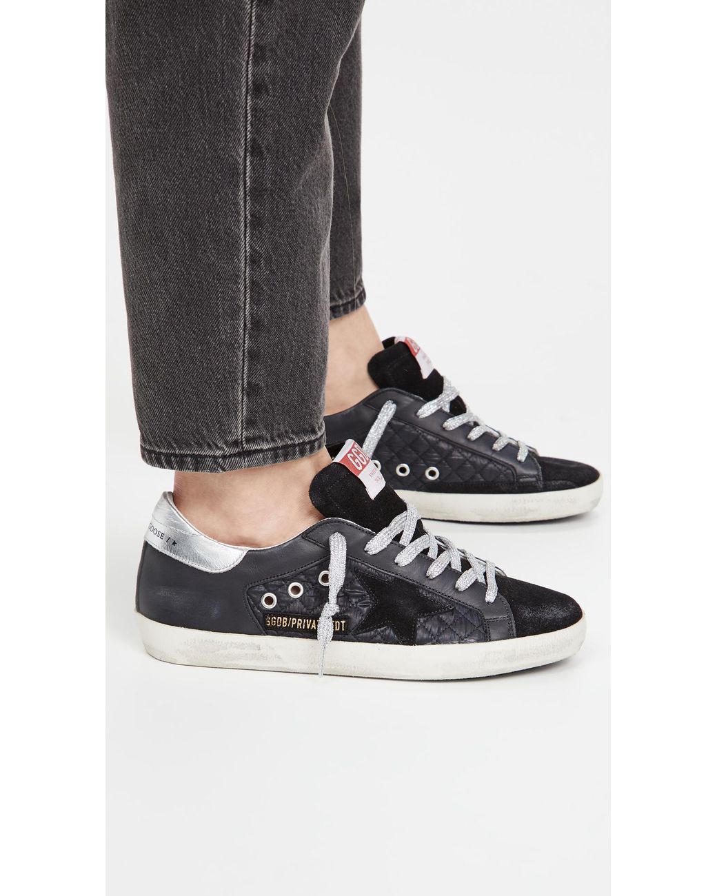 Womens black best sale golden goose sneakers