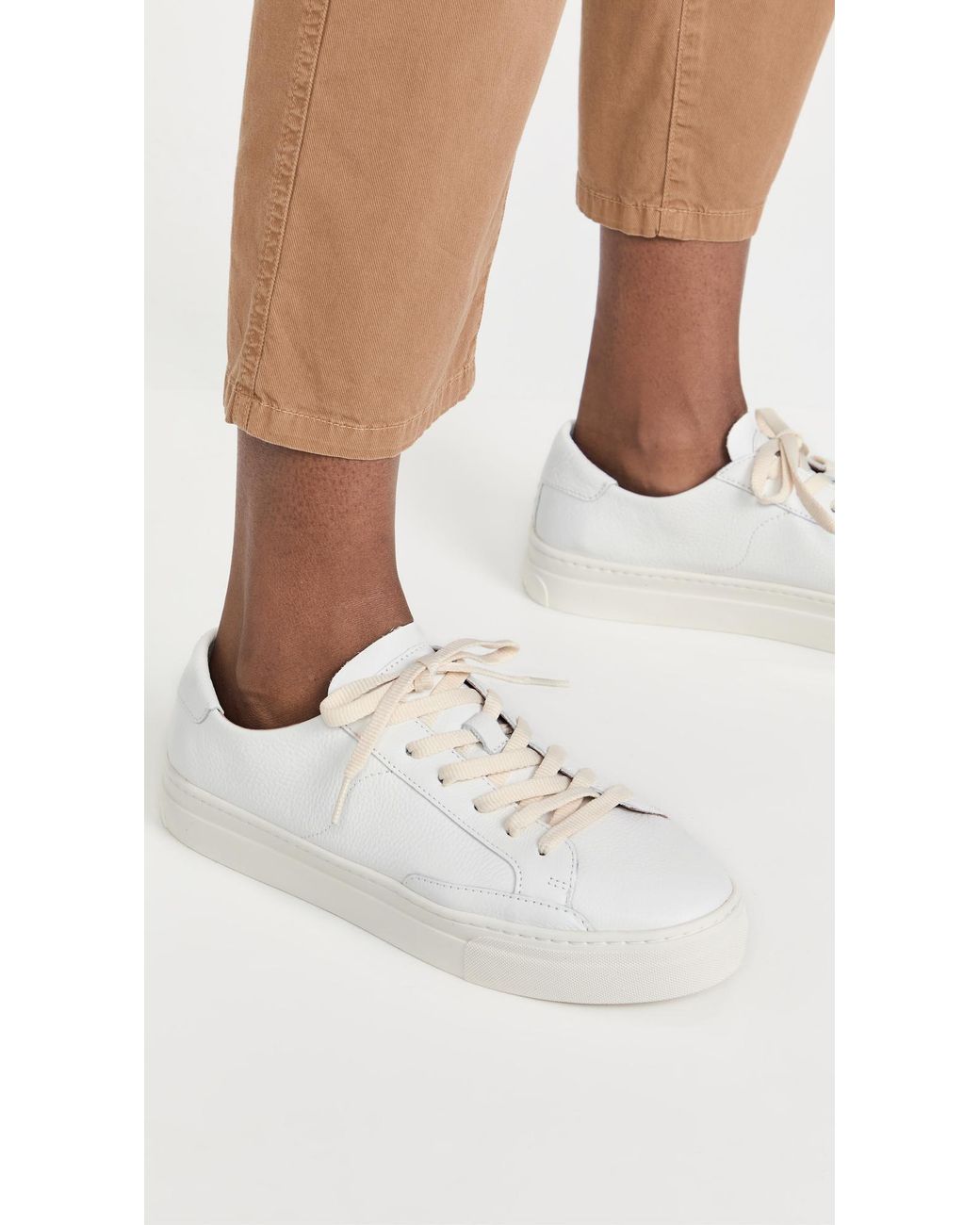 soludos white sneakers