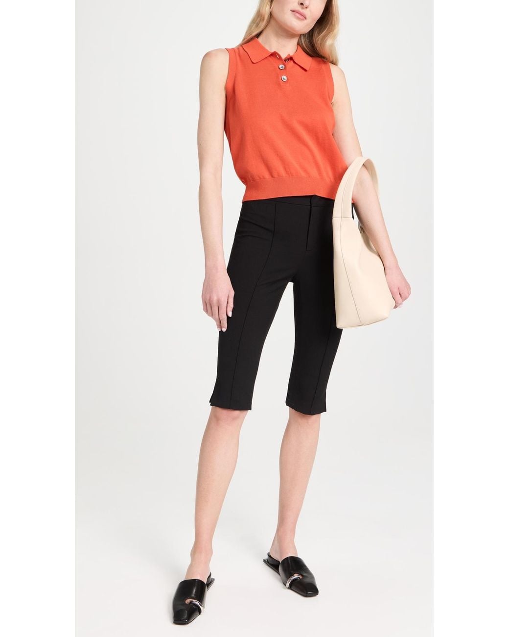 Tory Burch Black Pierced Mules