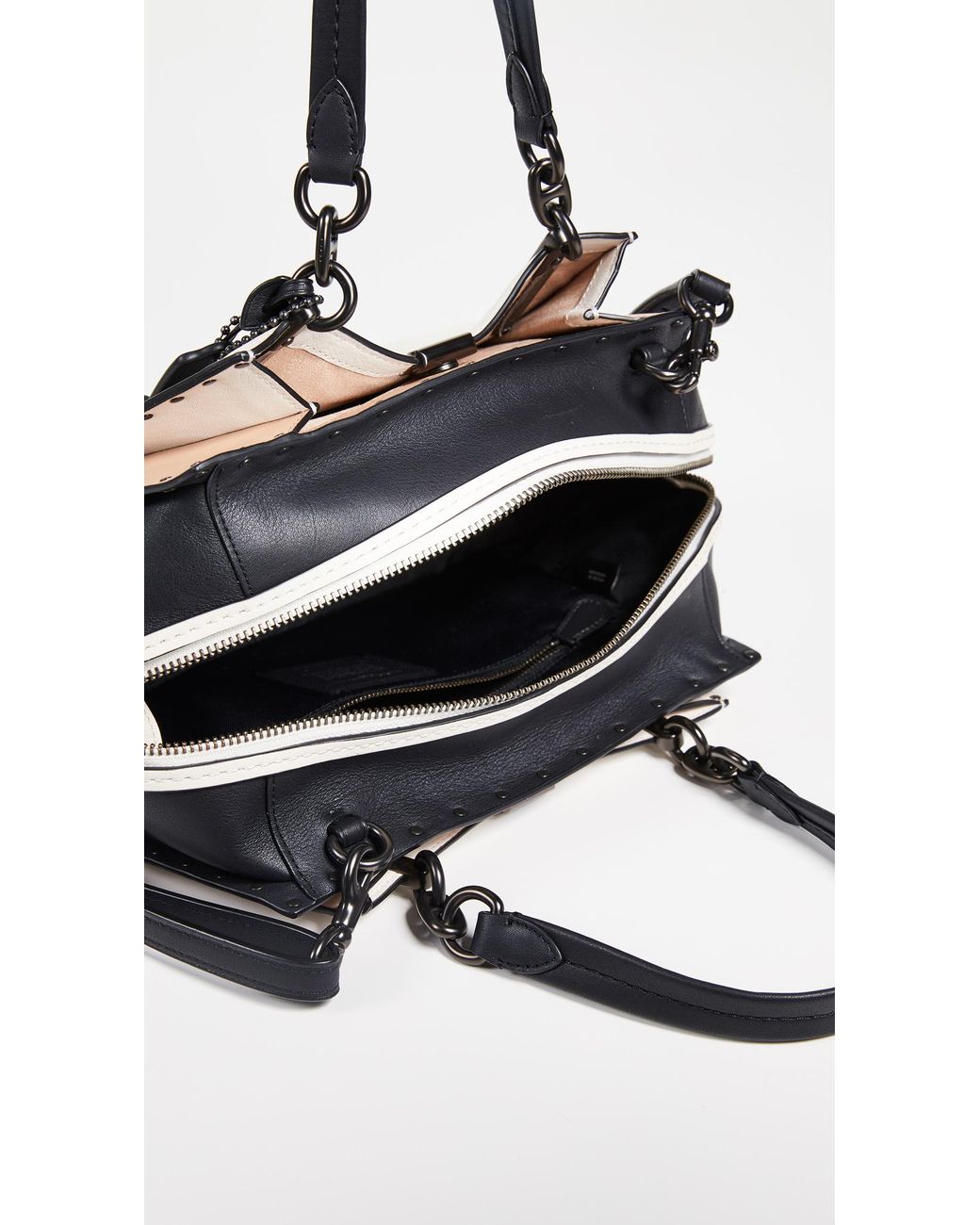 Coach border rivets shop mixed leather dreamer satchel