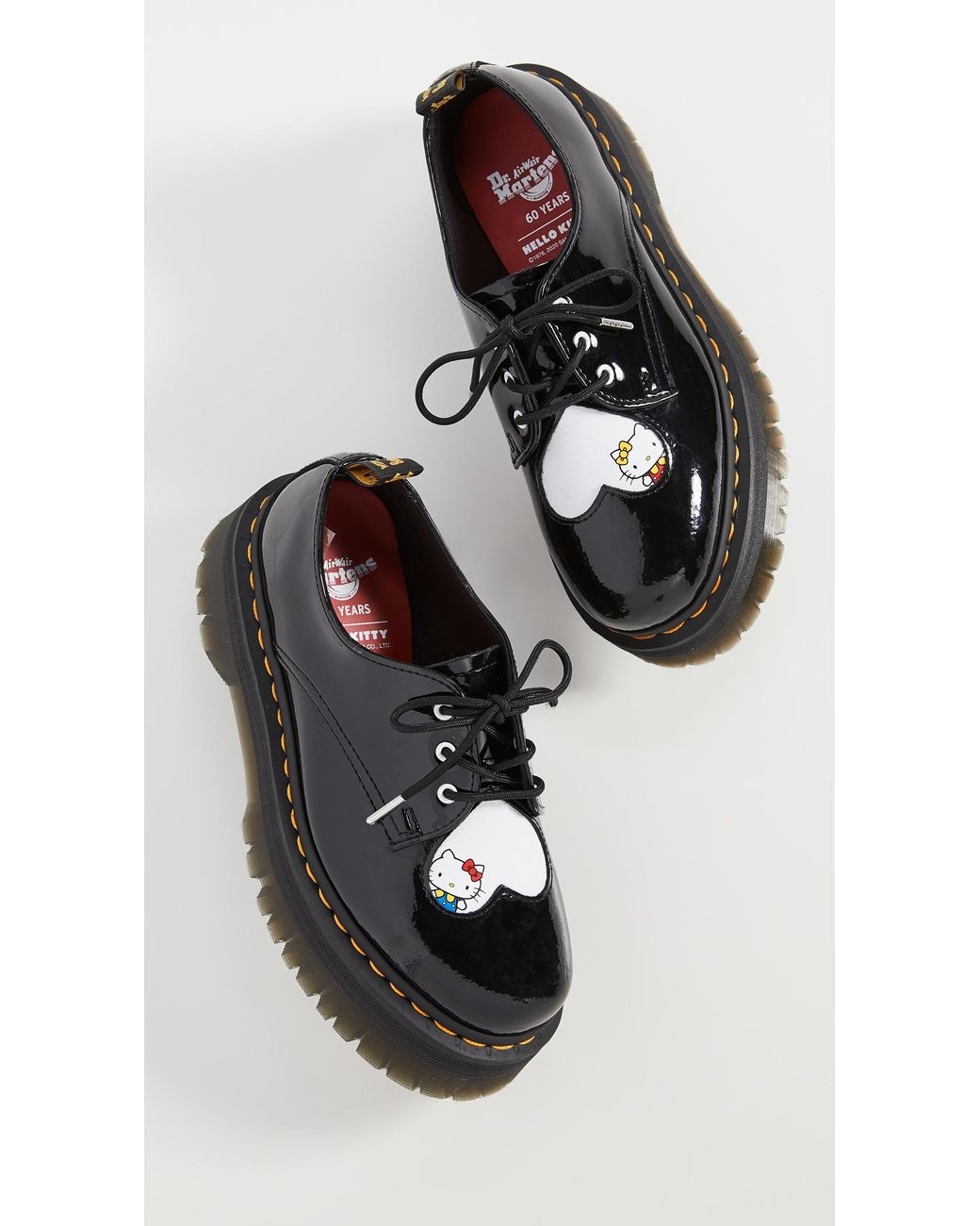 1461 quad dr martens hello kitty