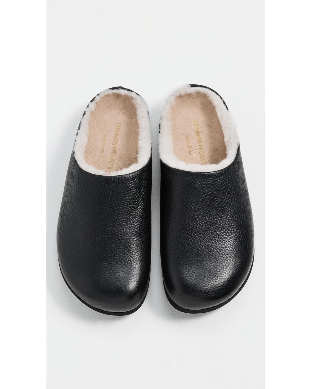 Common Projects Black Clogs
