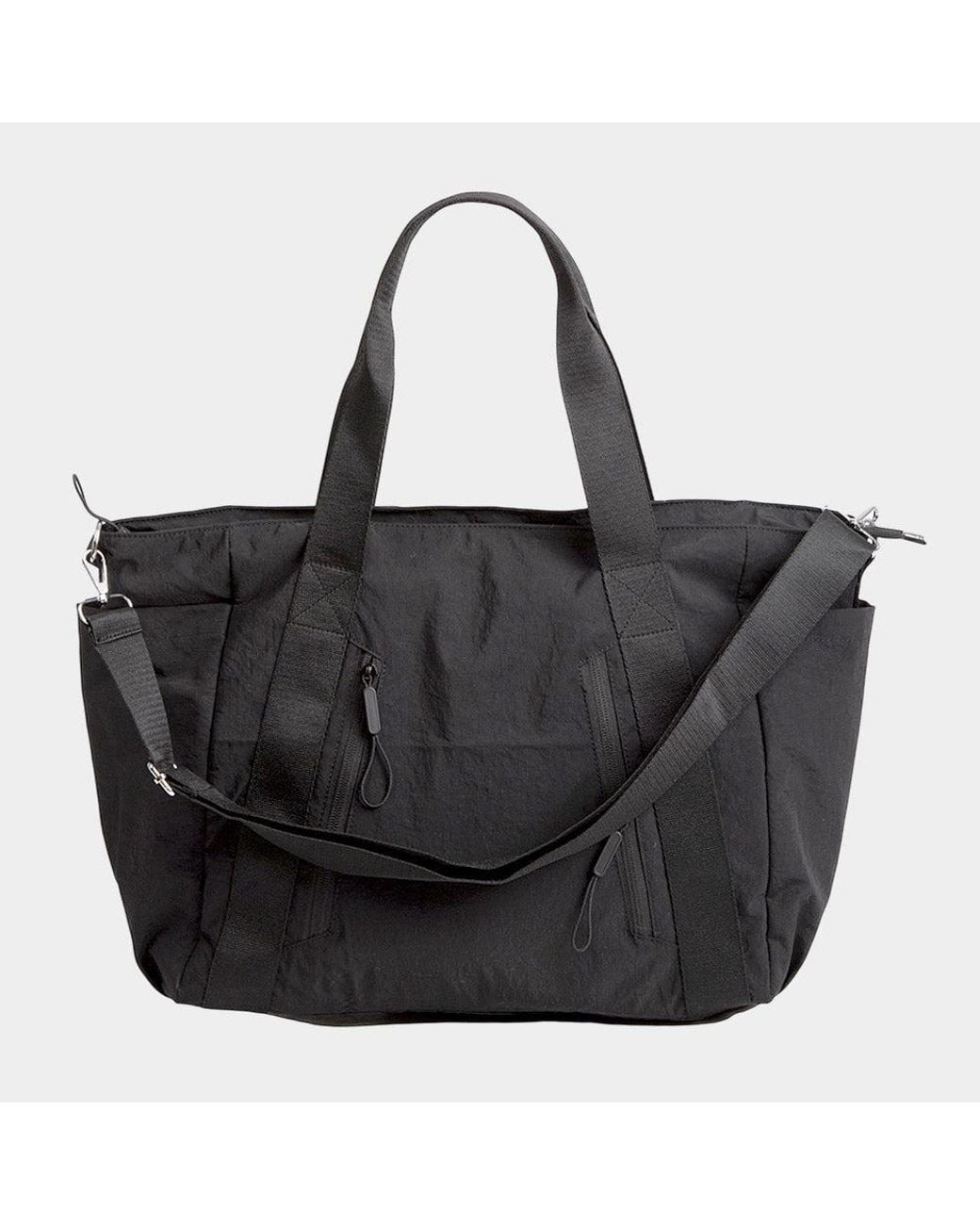 Fashnzfab Black Solid Spacious Multi Compartment Carryall Tote Bag