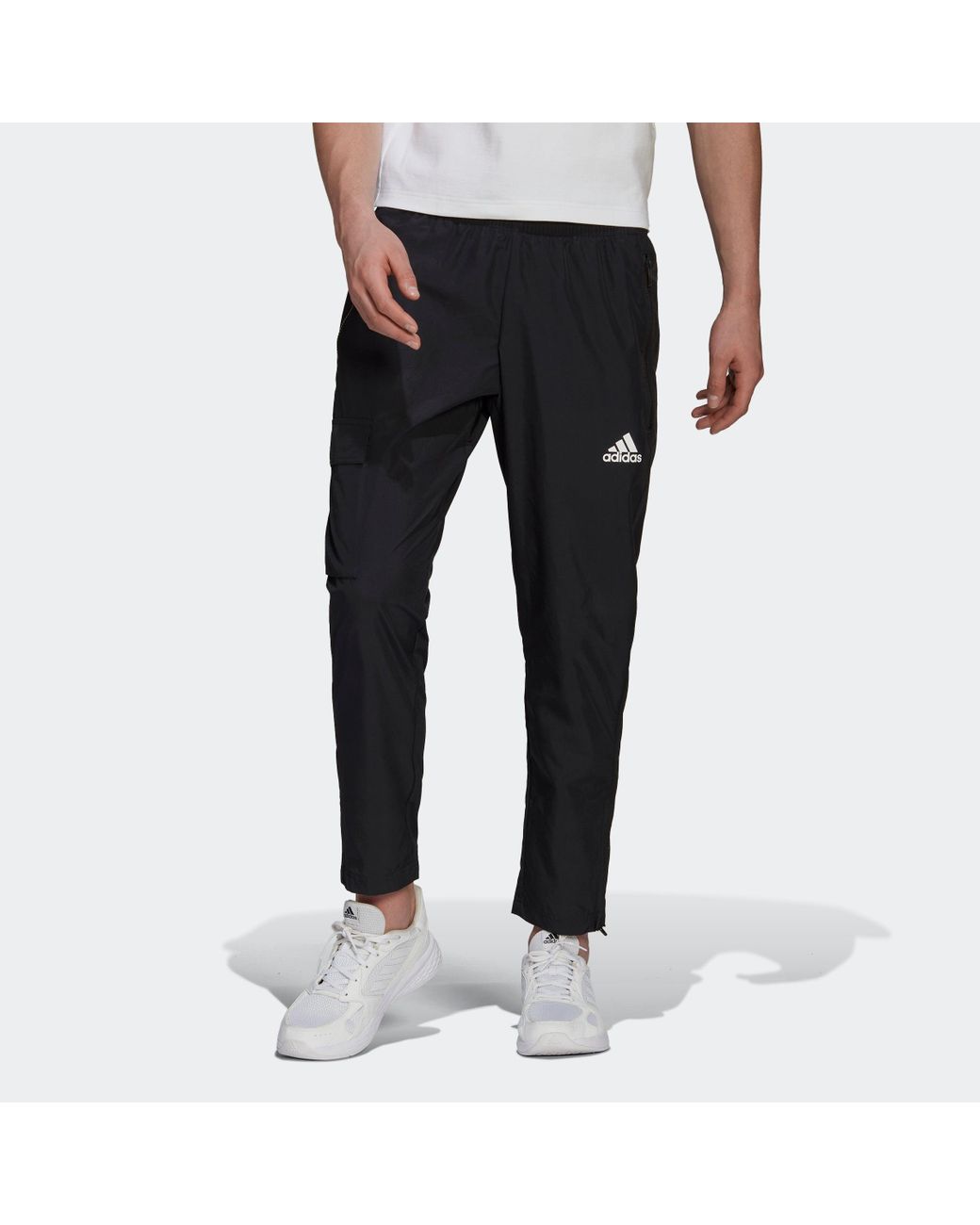 adidas Essentials Brandlove 7/8 Woven Pants in Black for Men | Lyst