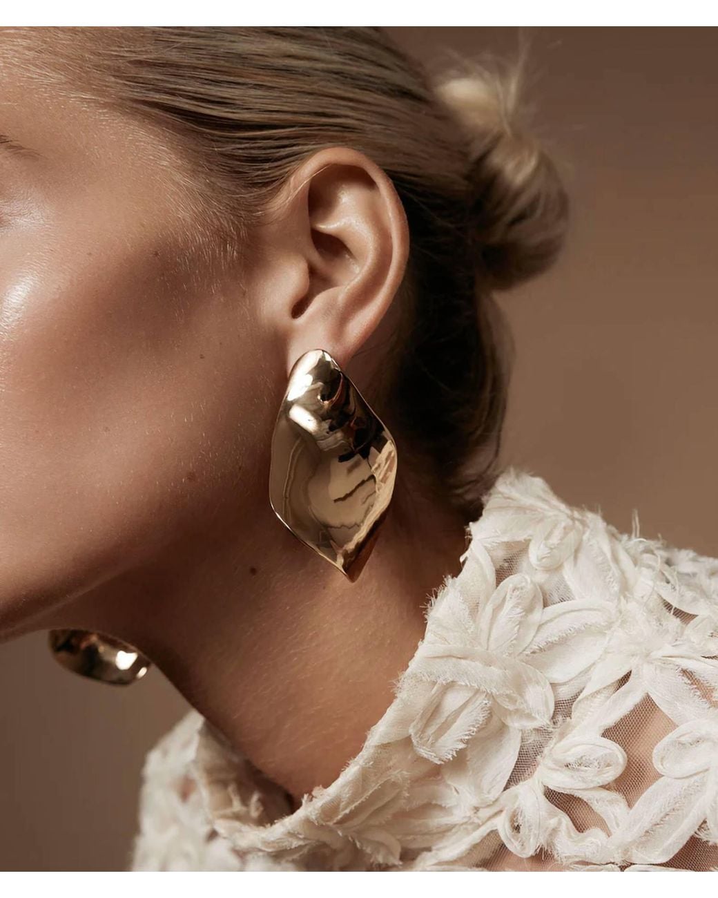 Shashi Brown Twisted Statement Earrings