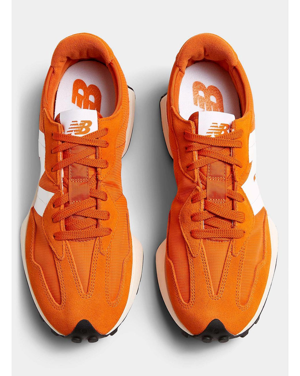 Orange new shop balance shoes