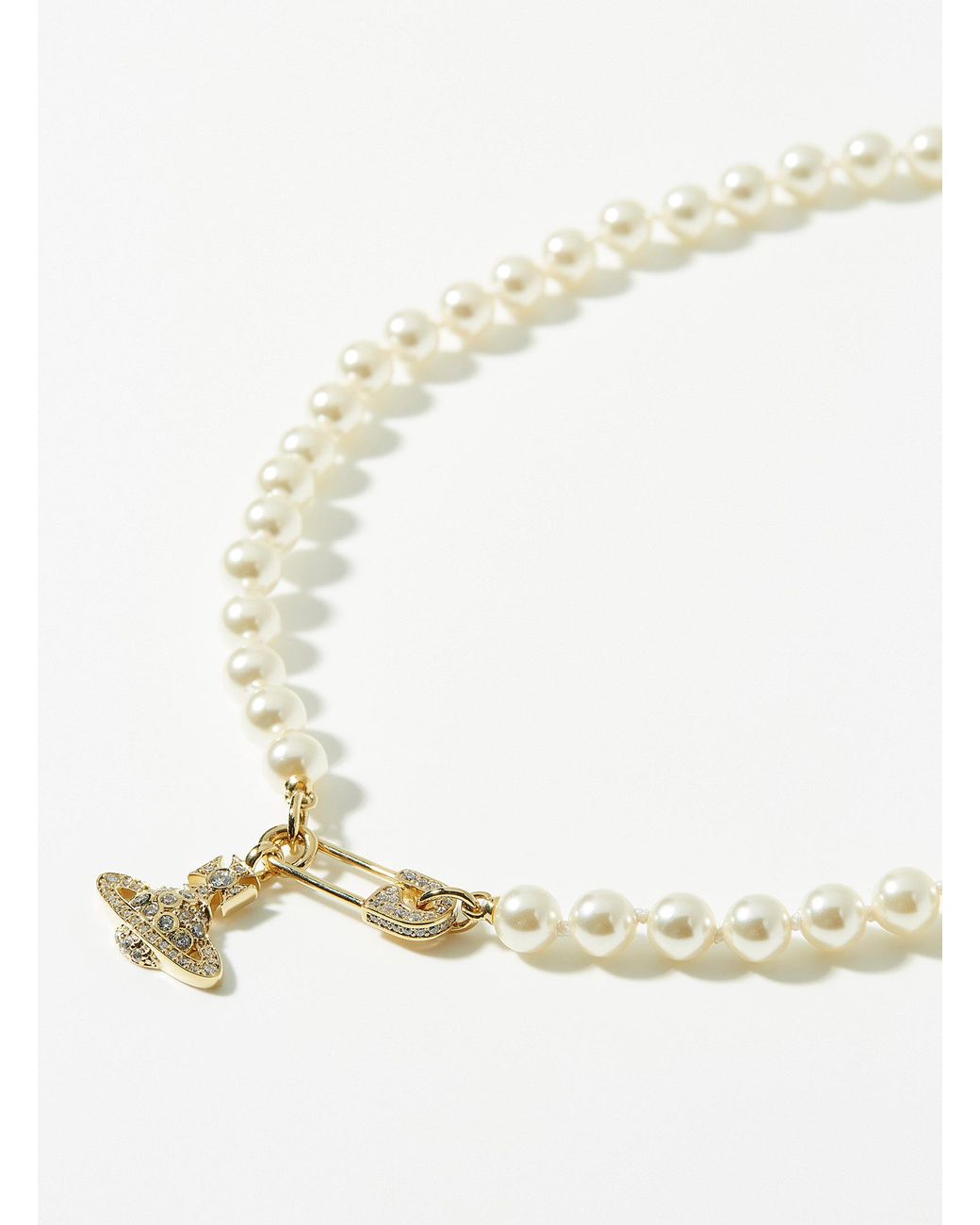 Vivienne westwood golden saturn pearl deals