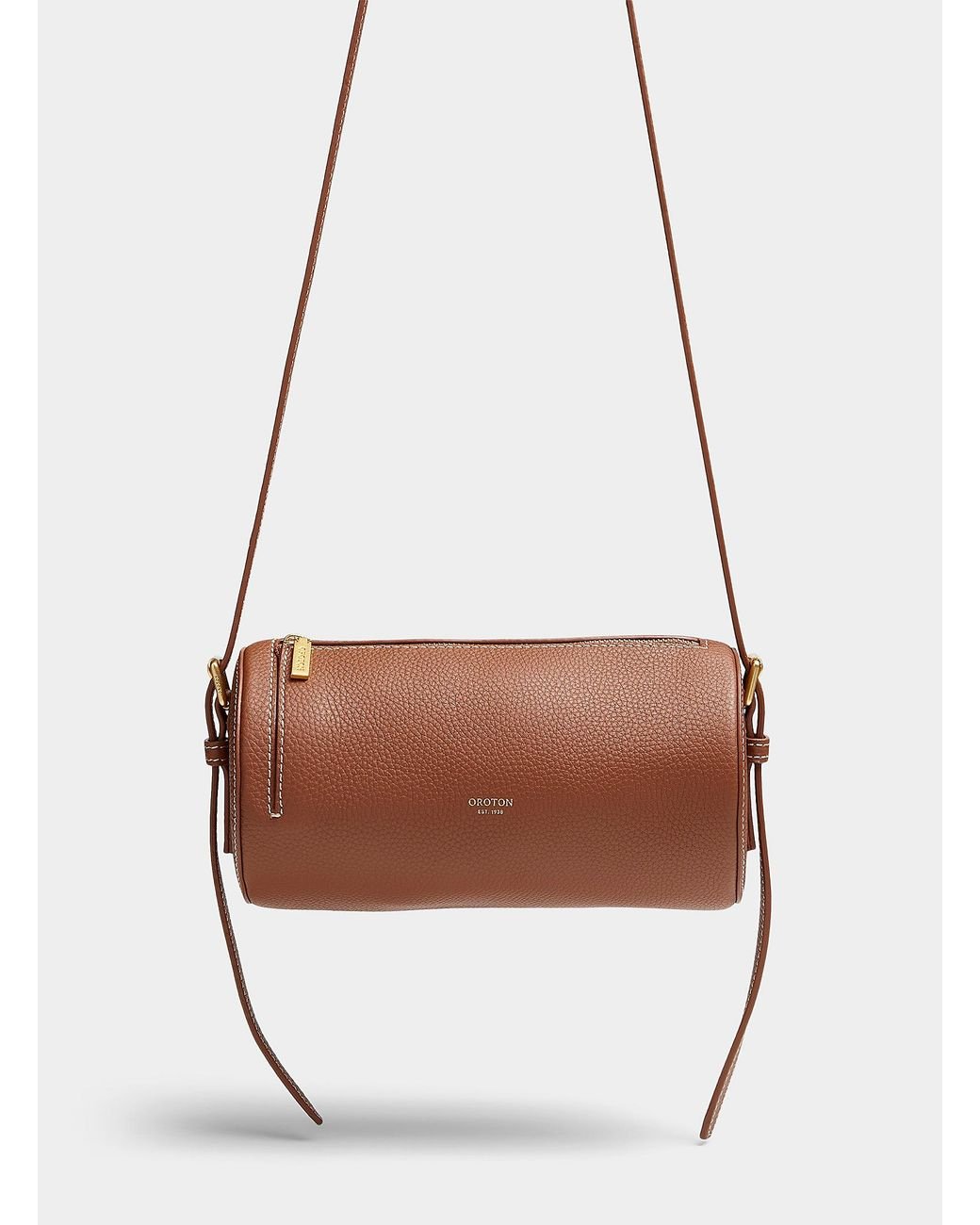 Oroton Margot Leather Cylinder Bag in Brown | Lyst Canada