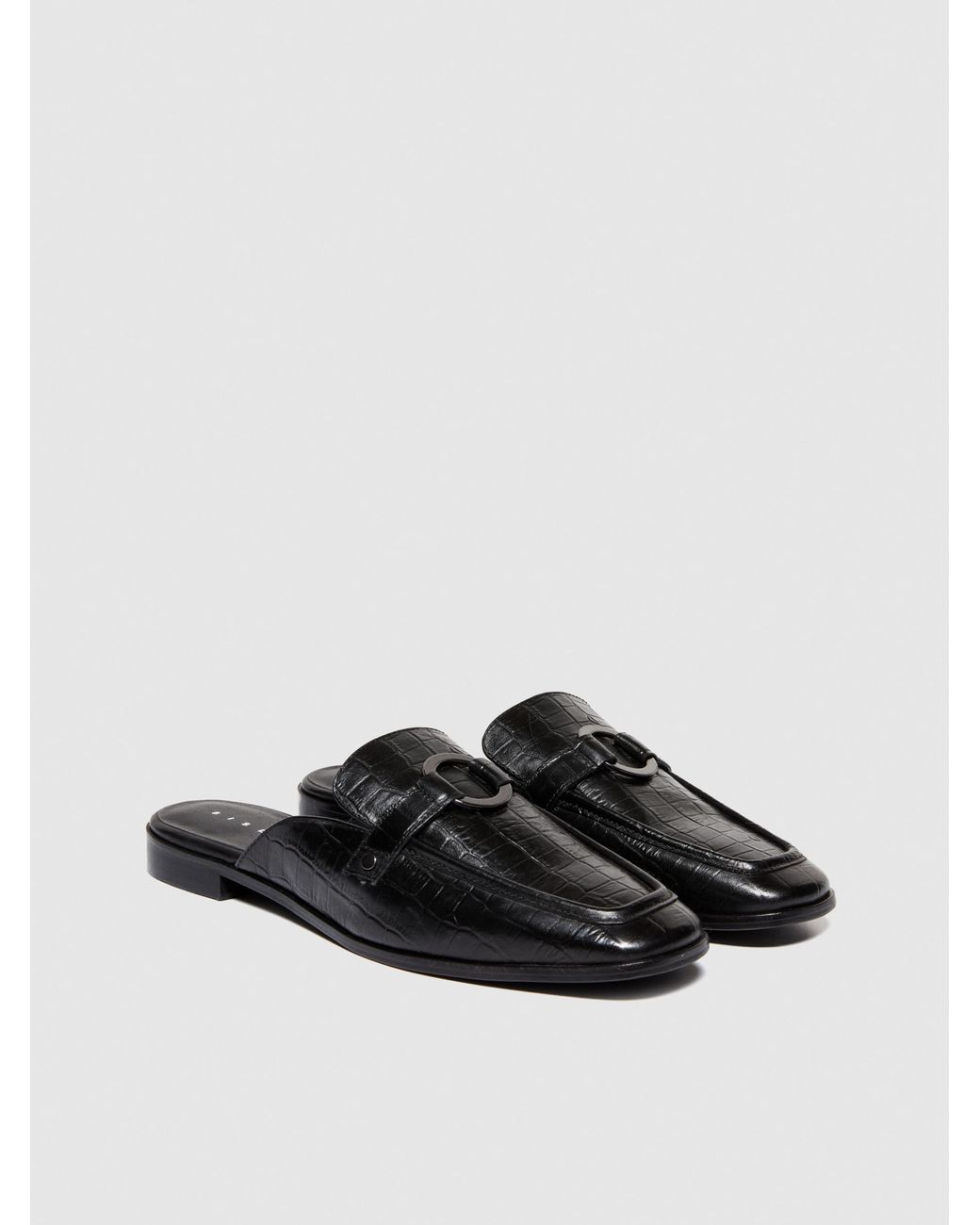 Mules In Pelle di Sisley in Nero Lyst