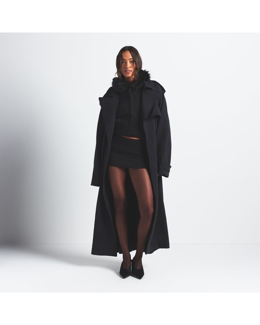 Skims Faux Fur Lined Zip Up Hoodie in Black | Lyst