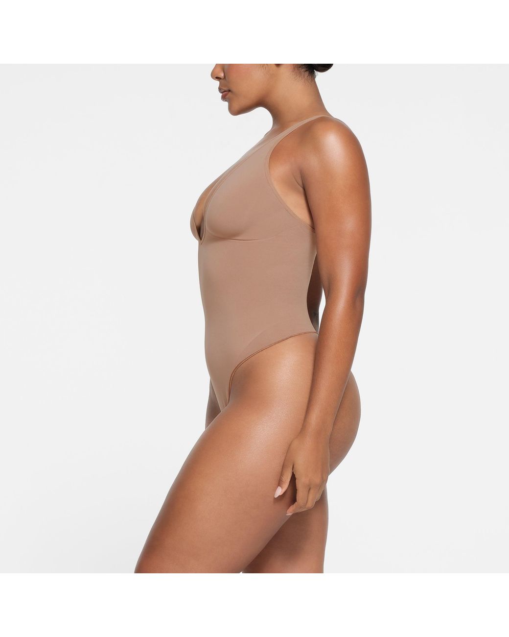 Skims Deep Plunge Thong Bodysuit in Brown Lyst