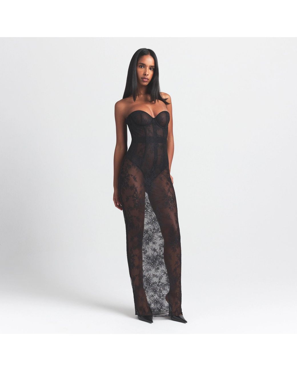 skims corset dress Midi | Onyx | Black | Skims Body | 3XL | 3X-Large | Plus Size Complete with adjustable straps and a hook and eye closure Skims Corset Dress