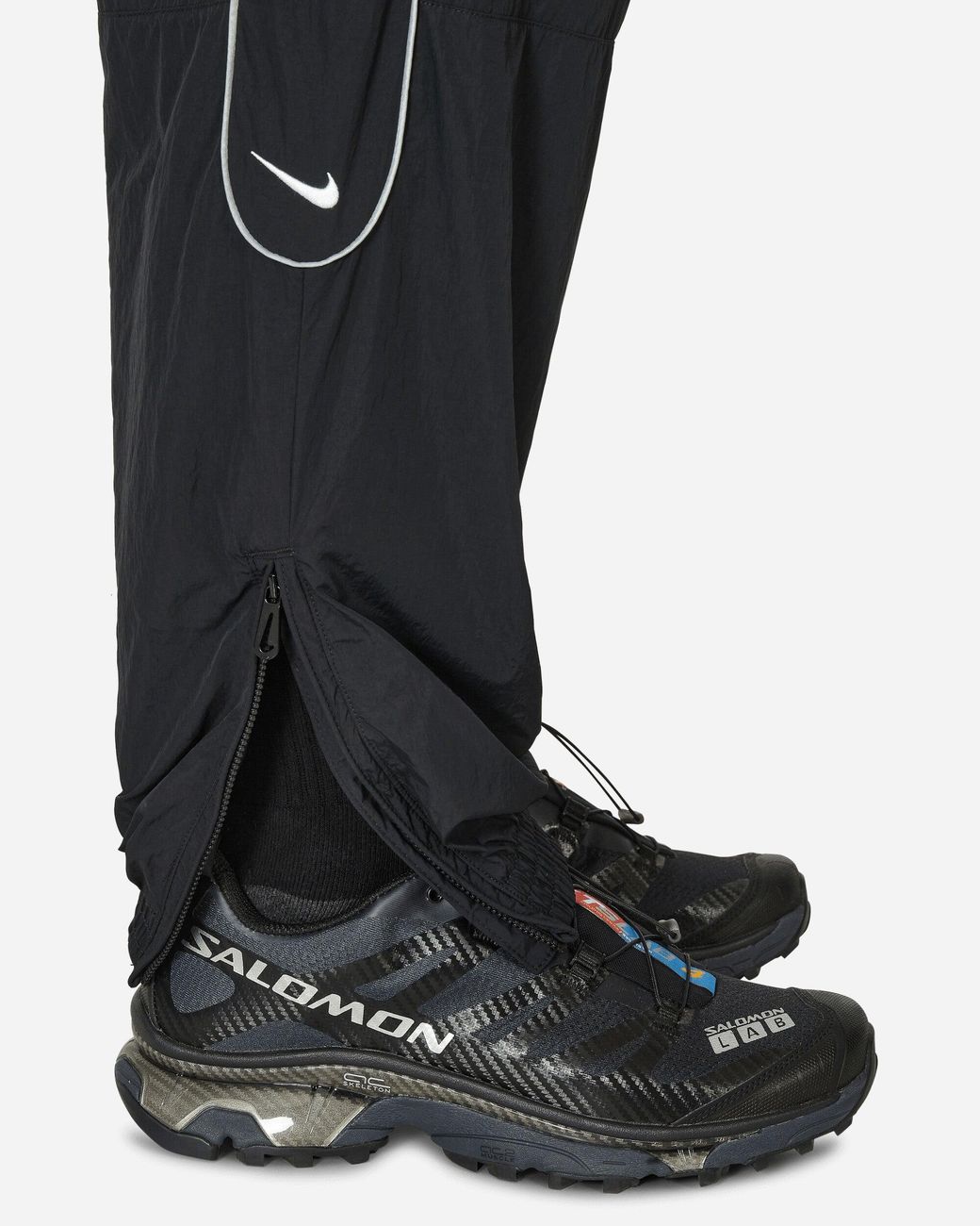 nike swoosh woven track pants