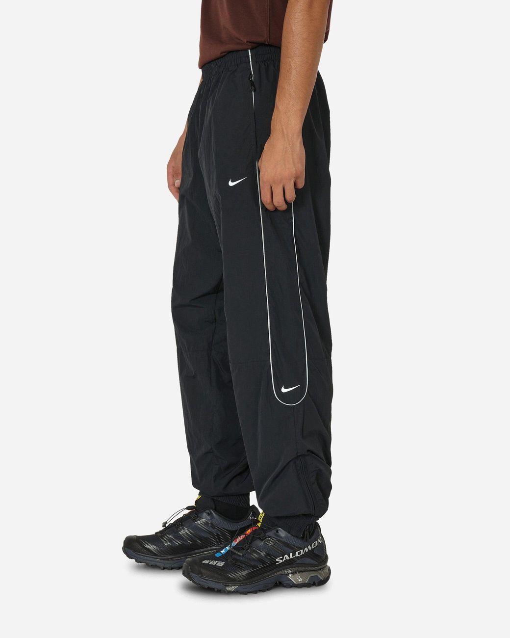 nike swoosh woven track pants